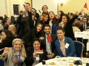 Professional fellows proudly waving their Egyptian and Tunisian flags after graduating from the program. 